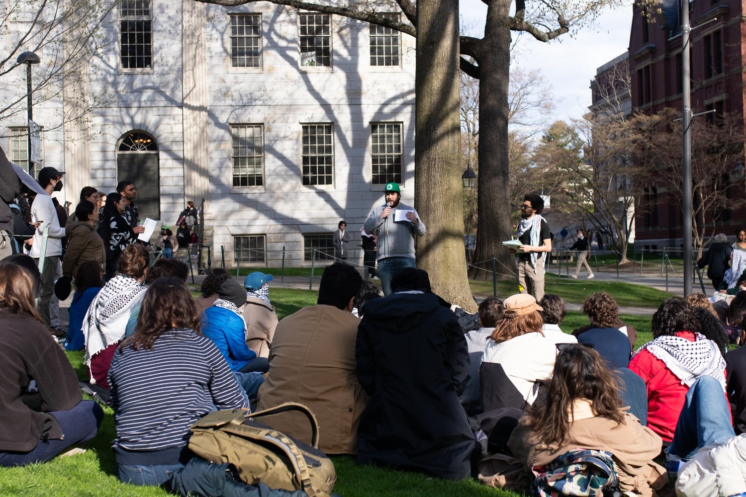 Pro-Palestine protesters lead a teach-in with members of the encampment and onlookers before University Hall Wednesday afternoon.