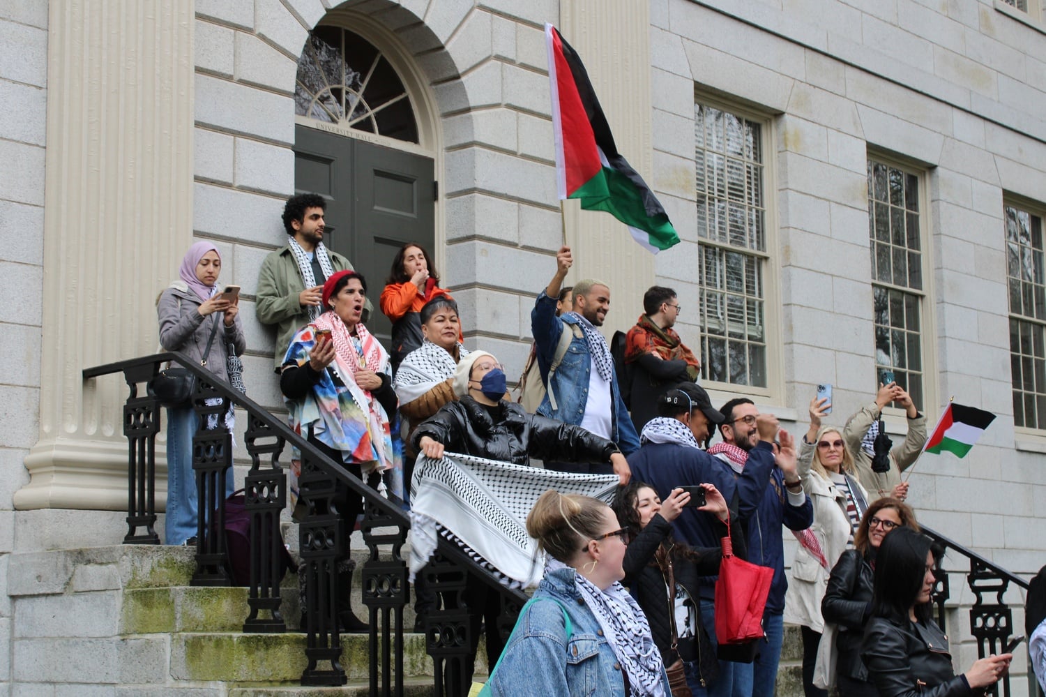 Protesters rally on the steps of University Hall amid the Wednesday demonstration.