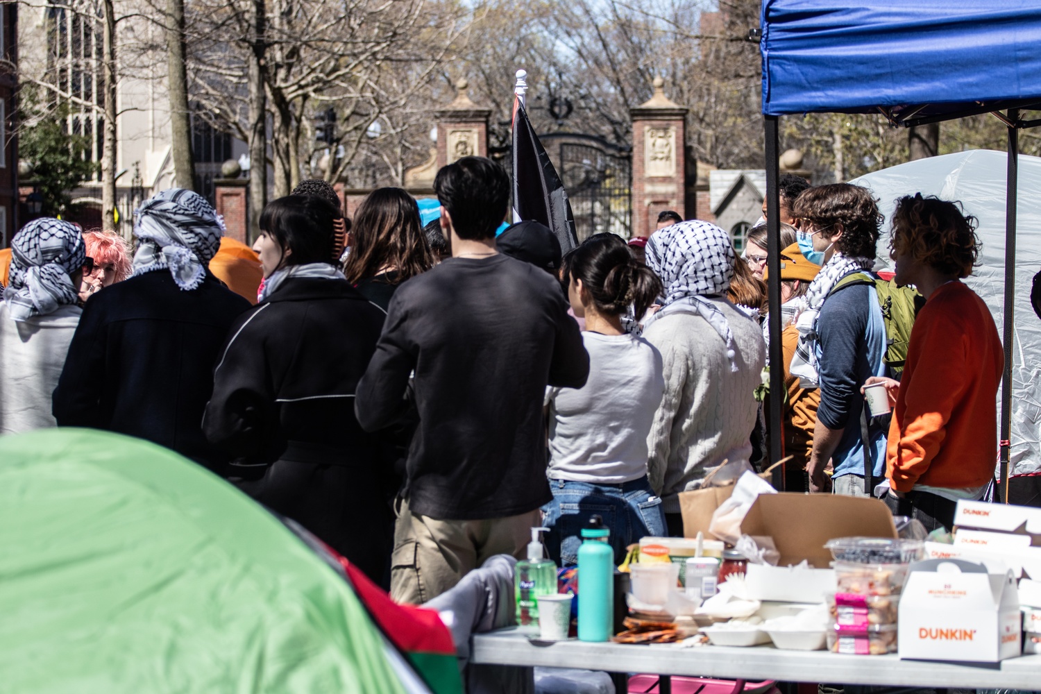 Encampment protesters gathered for morning meeting in Harvard Yard Thursday morning.