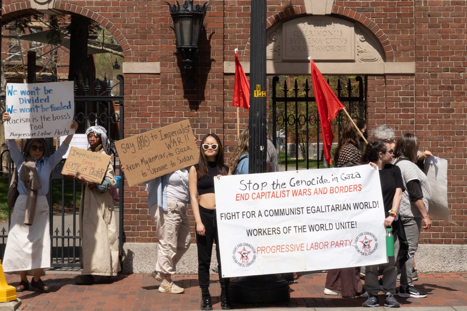 More than two dozen reporters marched down Massachusetts Avenue in solidarity with the Harvard Yard encampment.