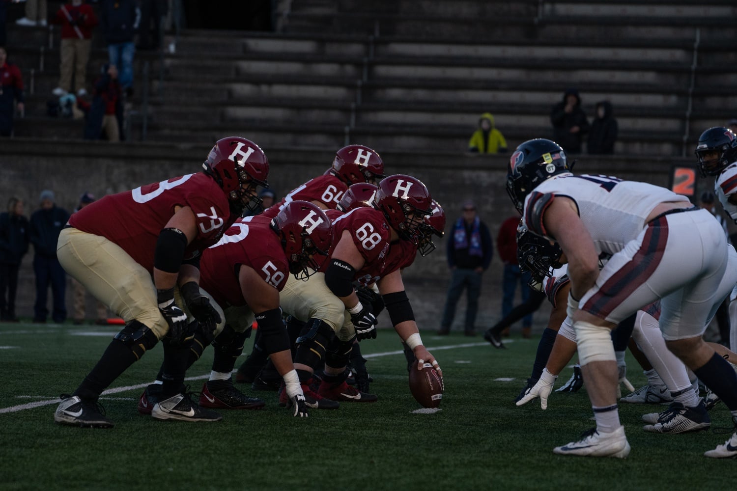 The Harvard football team's triple-OT nail-biter against the UPenn Quakers clinched it a share of the Ivy League title.