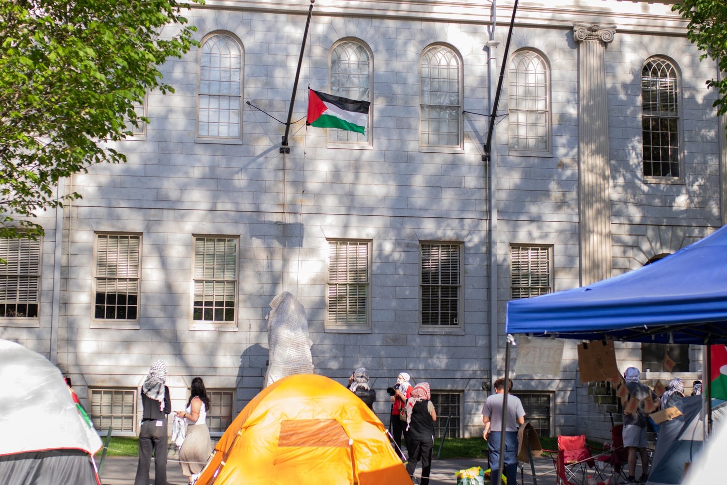 Protesters raised a small Palestinian flag on the University Hall flagpole shortly after 5 p.m., the second time they have done so since the start of the encampment.  Student protesters refused to submit to ID checks on Tuesday.