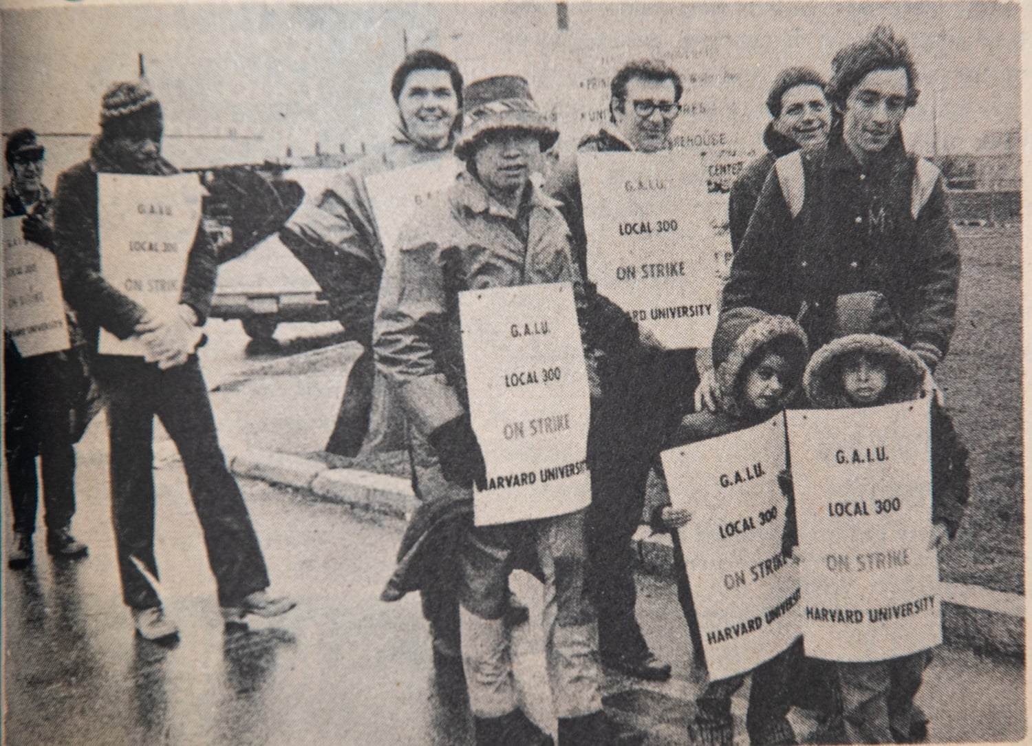 Members of the Graphic Arts International Union and supporters picket on Harvard's campus.