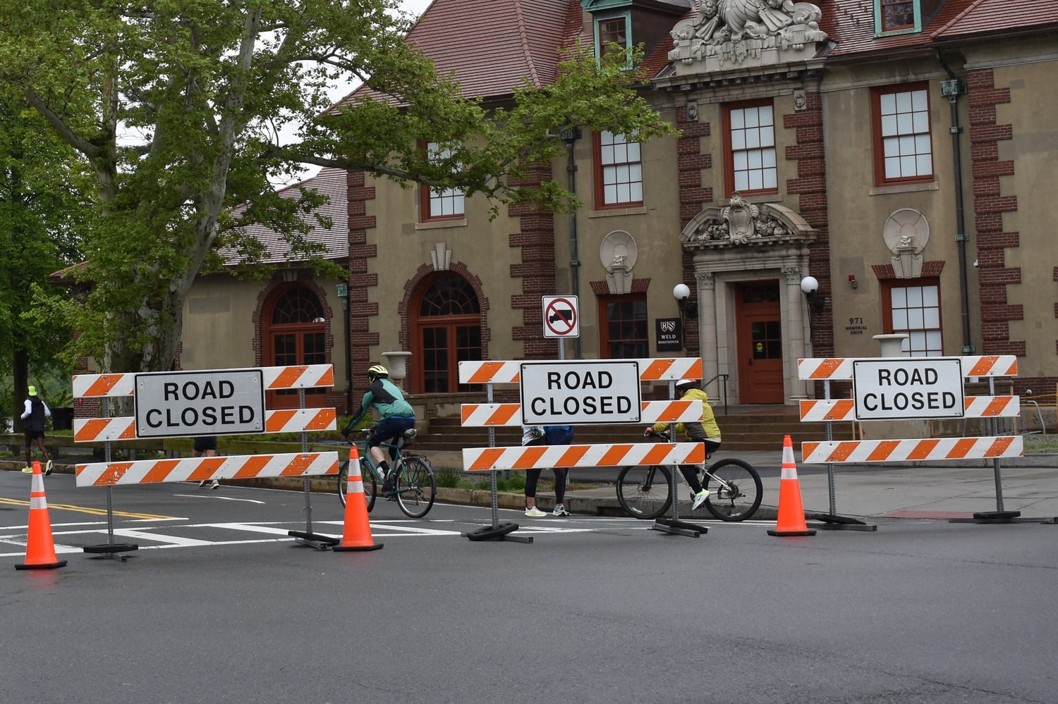 Barriers block vehicle traffic on Memorial Drive during Sunday closures for pedestrians and bikers.