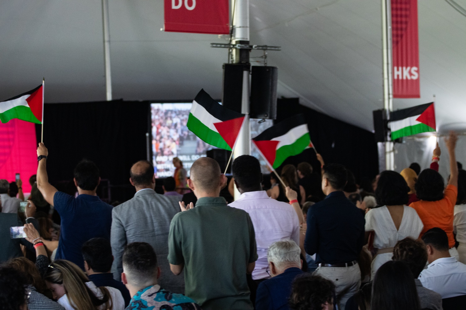 Mirza left the stage with a standing ovation from fellow graduates, several of whom were waving Palestinian flags.