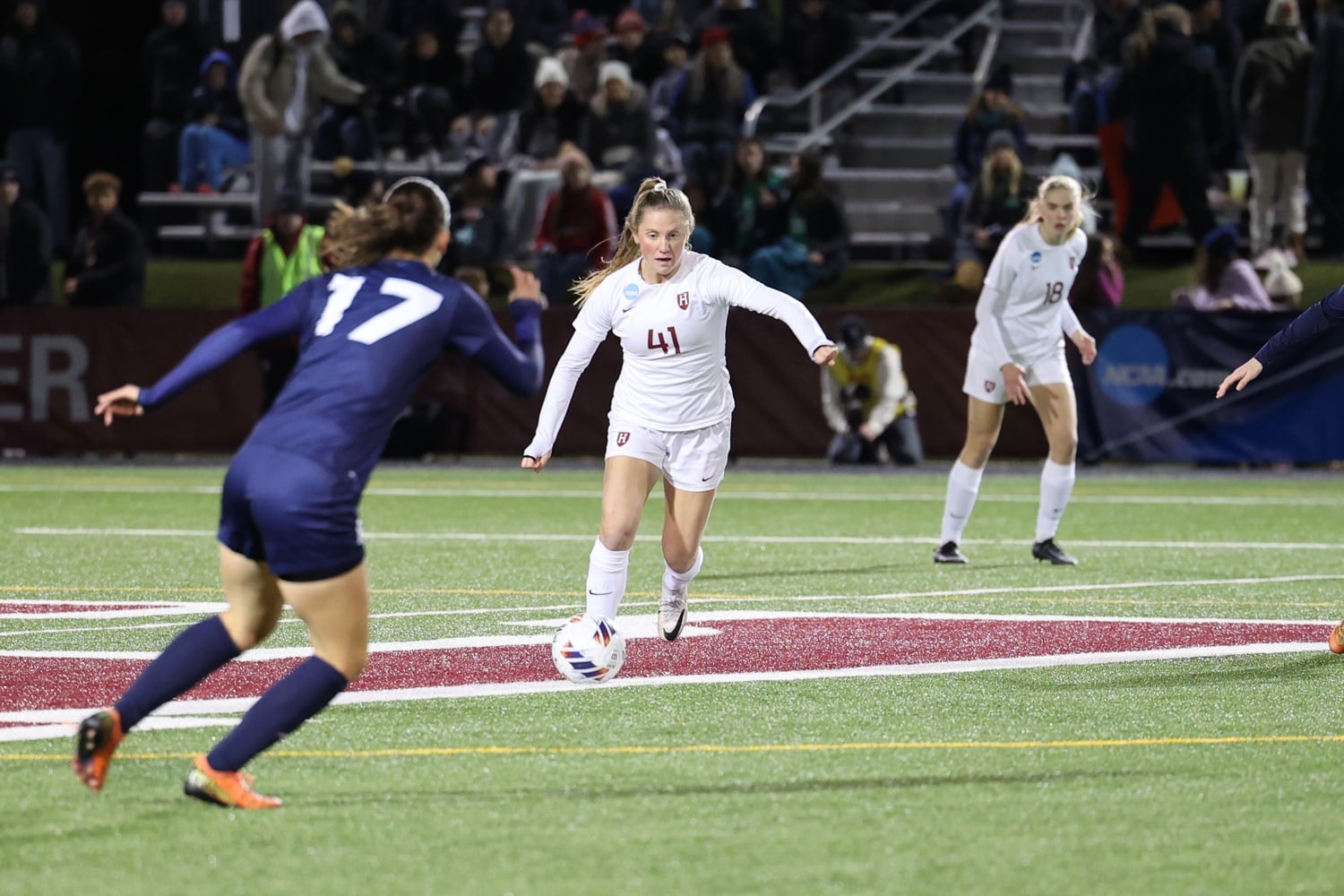 Hannah Bebar, the Crimson star who will take her talents to Duke next year, approaches the ball in a game against Maine last fall.