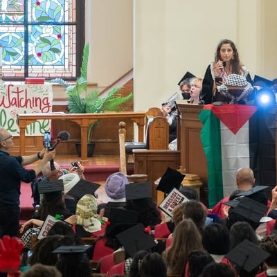 Cover image for Pro-Palestine Protesters Stage Mock Commencement at Harvard