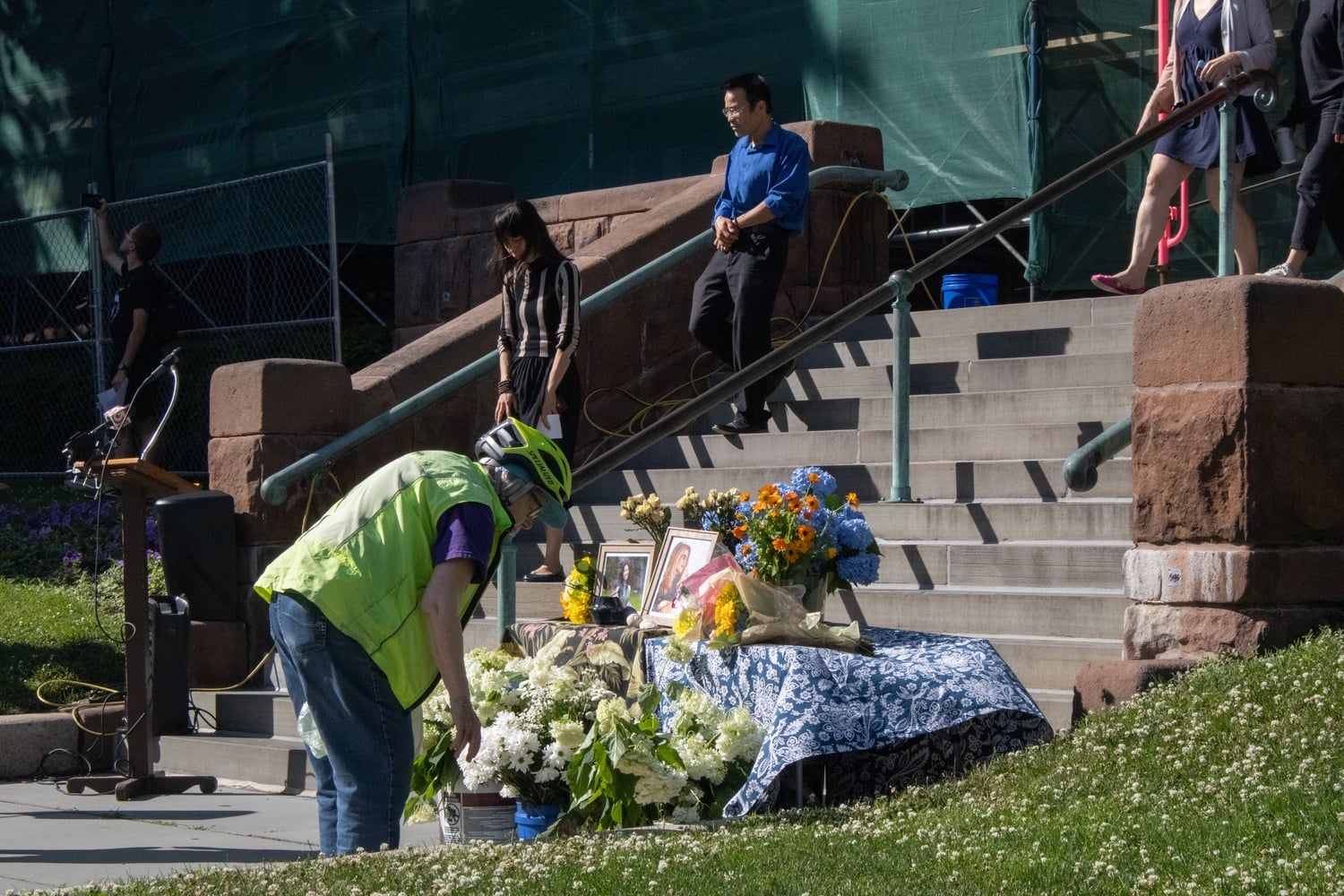 Mourners leave flowers at a memorial for two Cambridge cyclists killed in traffic collisions in June 2024, Kim Staley and Minh-Thi Nguyen. The family of Nguyen filed a wrongful death lawsuit on Wednesday.