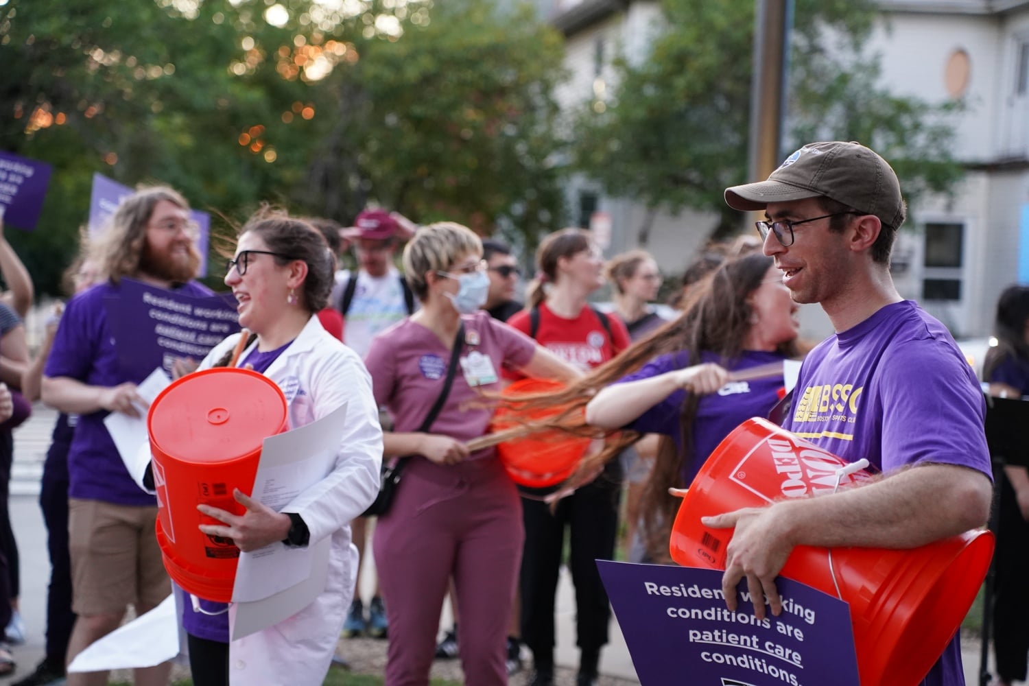 Cambridge Hospital Alliance workers protest outside of the Cambridge City Hall in August.