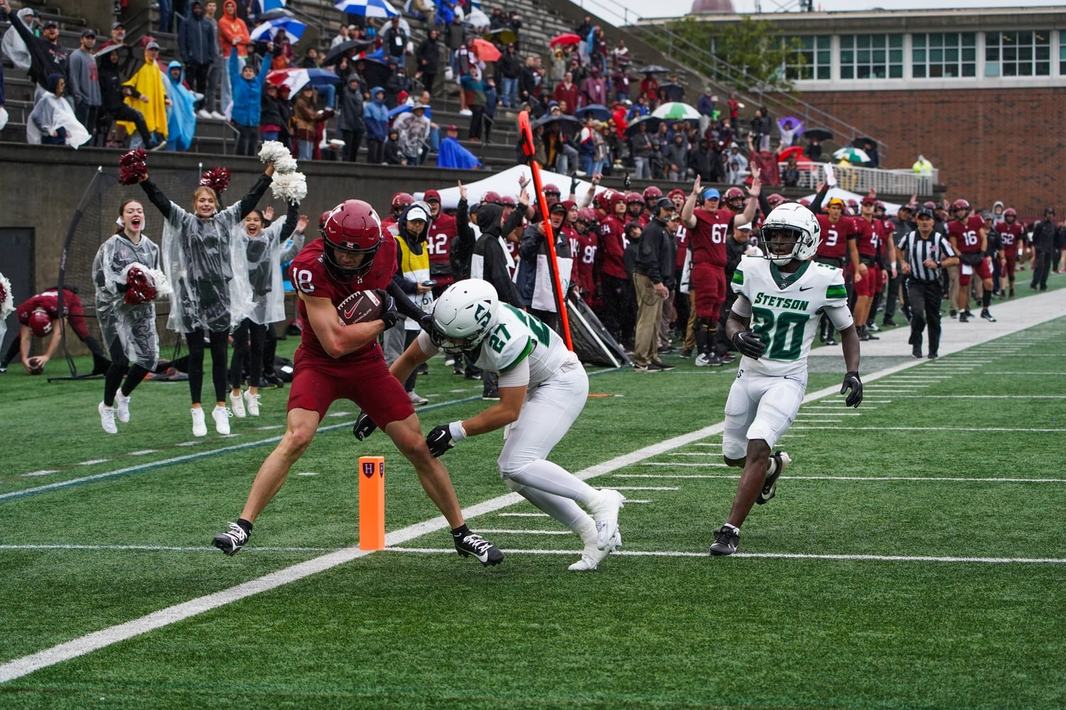 Junior wide receiver Cooper Barkate gives the Crimson its last touchdown of the game, catching a 25-yard touchdown pass from junior quarterback Jaden Craig to seal the score at 35-0.