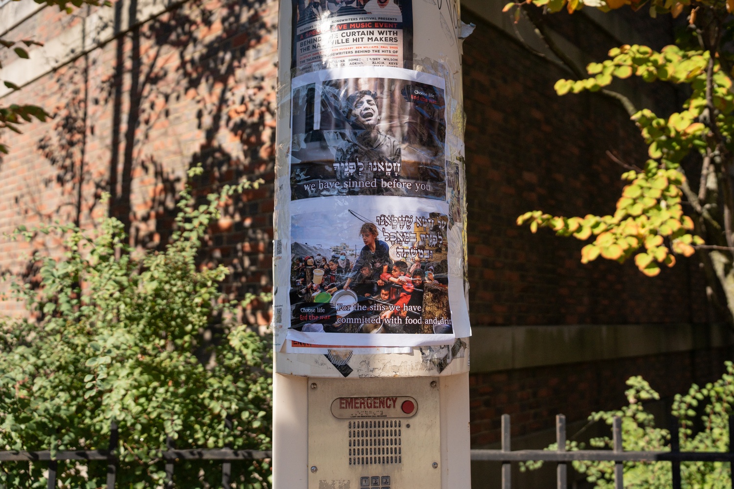 A flyer hung by J Street U members on a pole outside Hillel using the organization's funding Tuesday.
