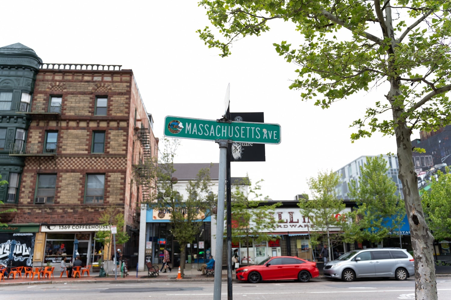 Cambridge police arrested a man after a standoff that began when he threatened bystanders with two large knives near a Central Square bus stop.