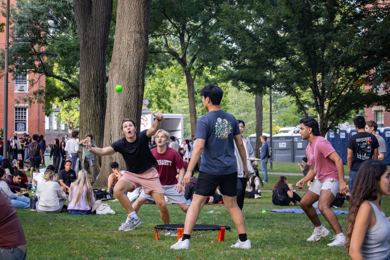 Students play spike ball in Harvard Yard during Crimson Jam in September. A group of Harvard faculty and administrators launched a new app for physical and social activities.