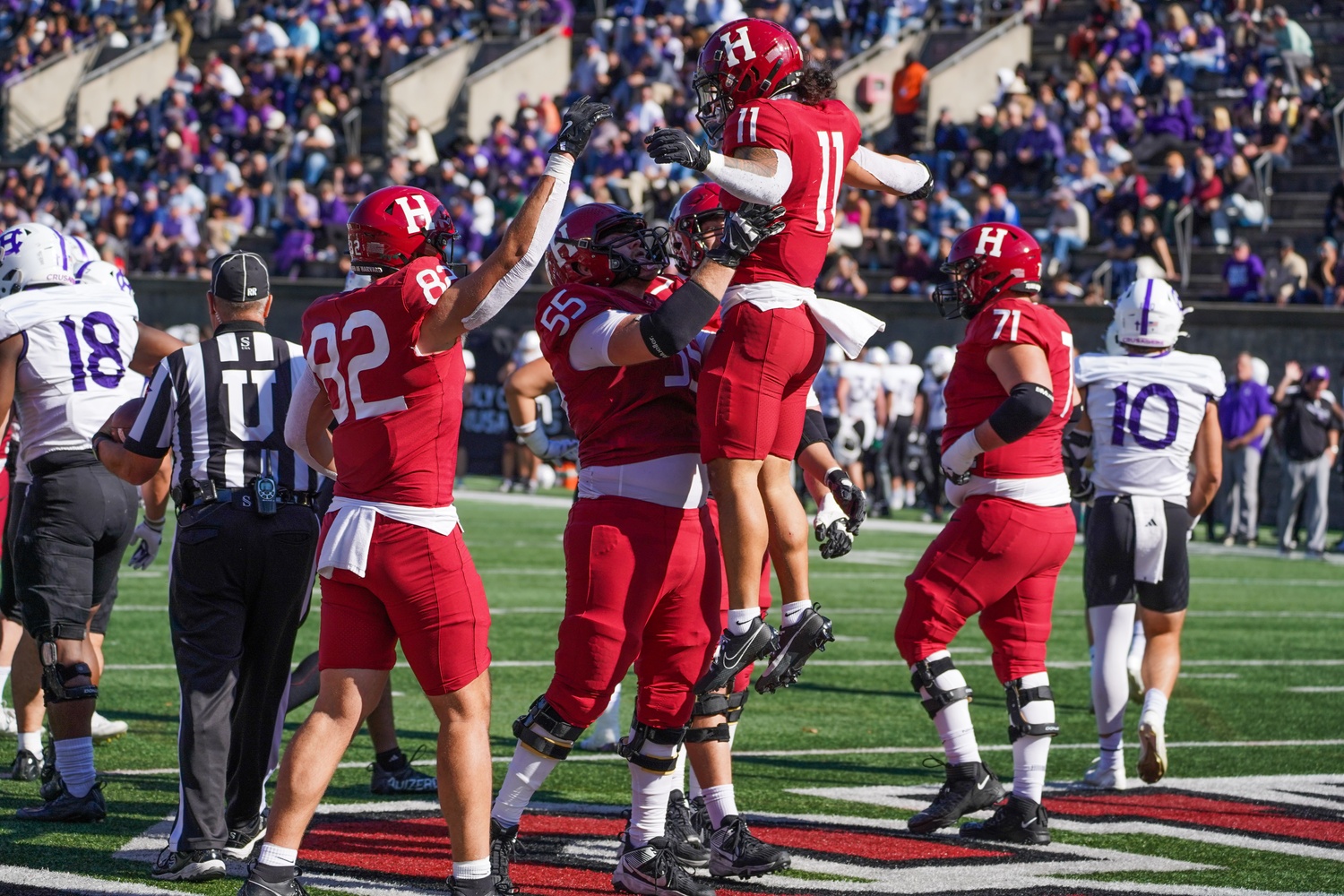 Sophomore running back Xaviah Bascon celebrates a touchdown with teammates.