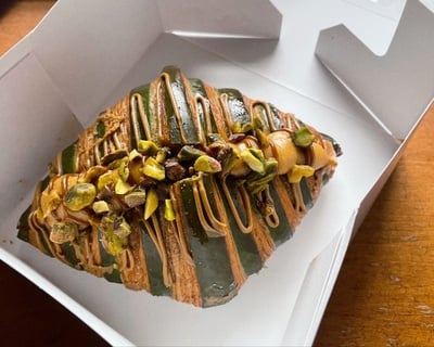 Cover image for Lakon's Pistachio Croissant