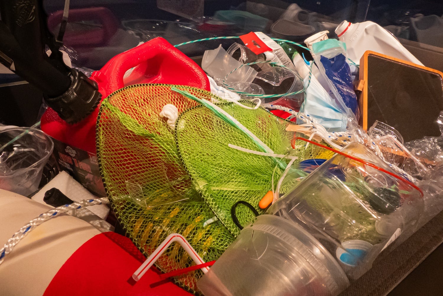 Filled with packaging, bottles, and nets, “Who Are The Ocean’s Real Monsters?” challenges notions of who sea monsters really are.