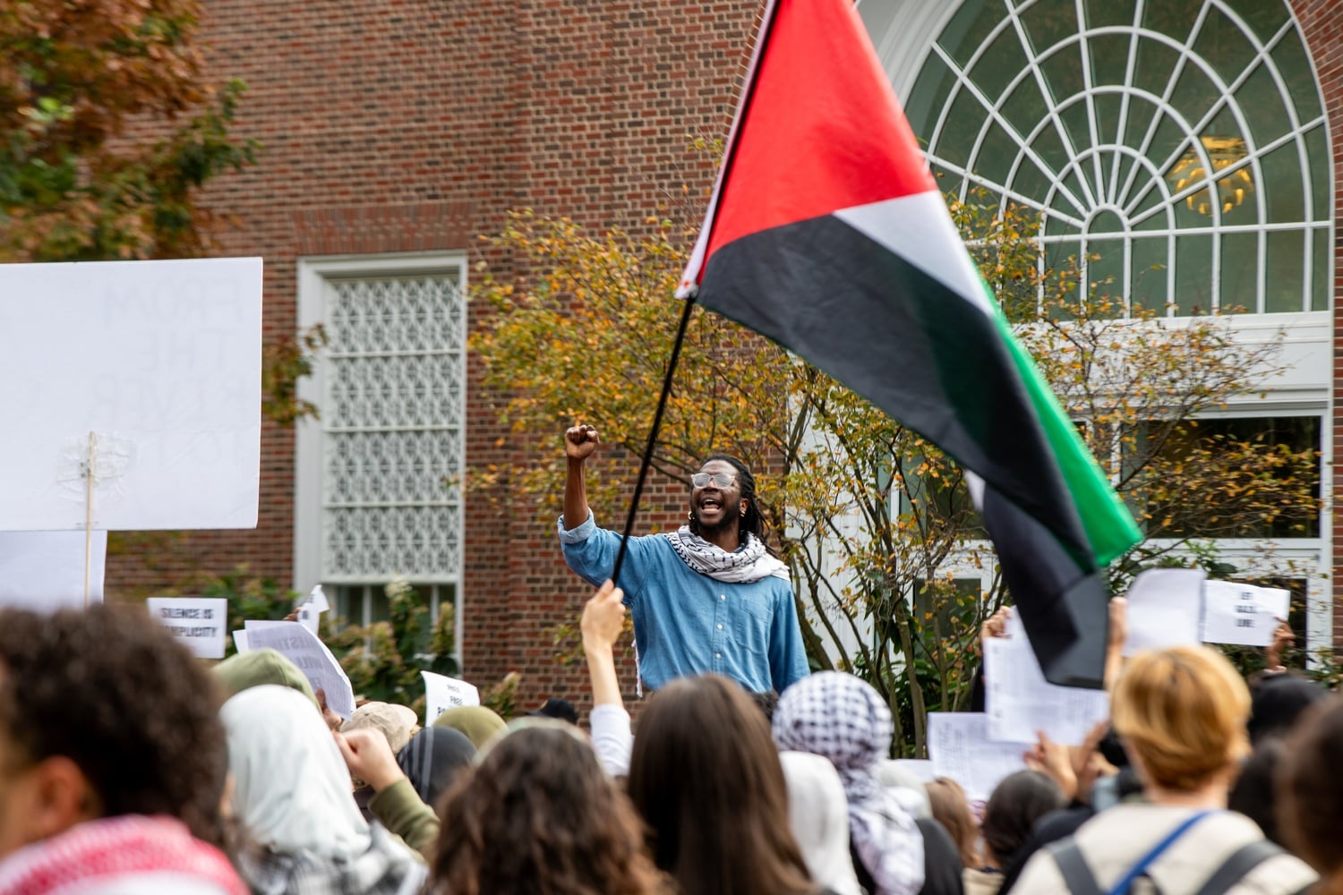 Harvard Divinity School student Elom Tettey Tamaklo, pictured at an October 2023 pro-Palestine protest, pleaded not guilty alongside another graduate student for assault and battery charges.