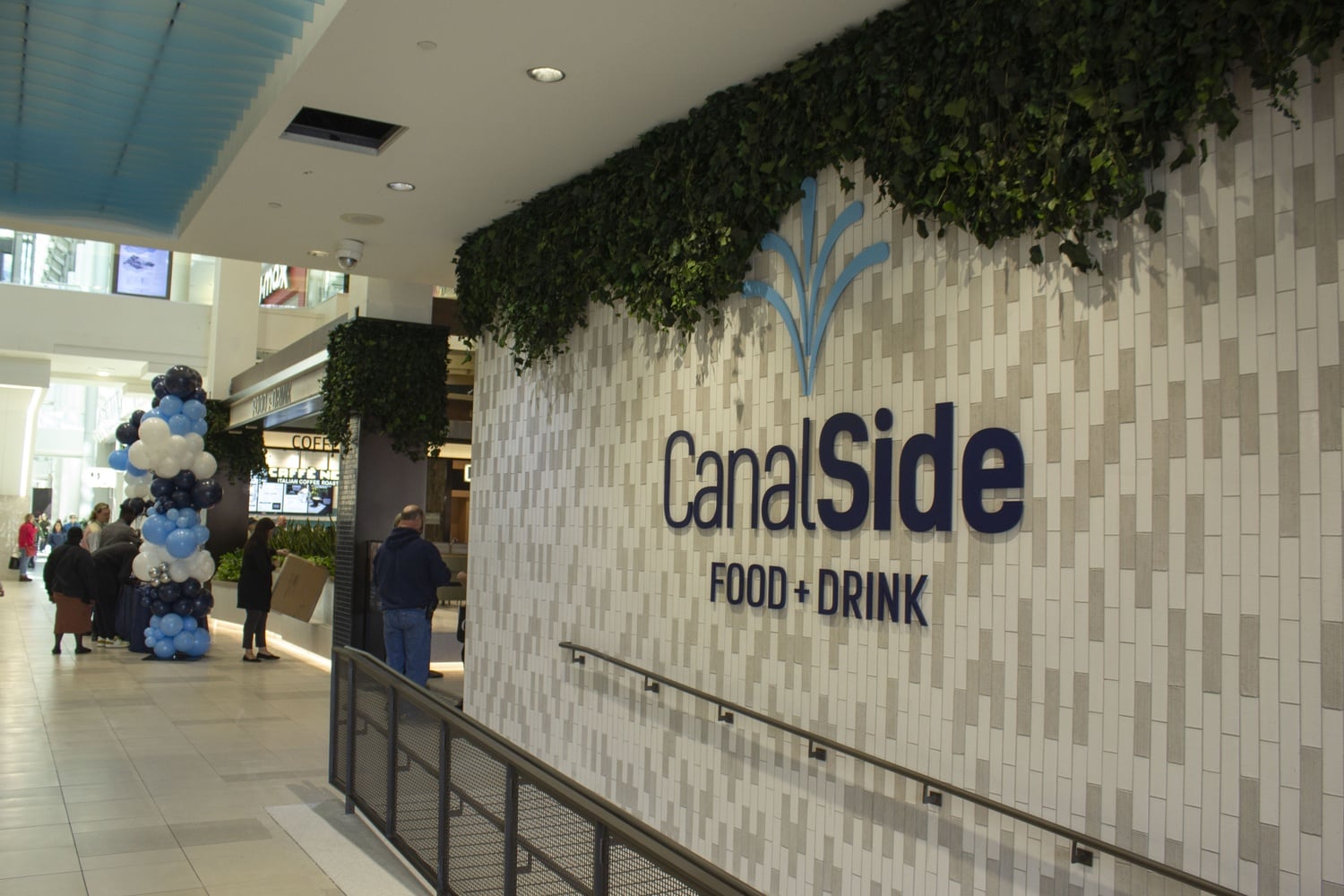 Workers, college students, and shoppers gathered at CambridgeSide mall to celebrate the grand opening of CanalSide Food + Drink.