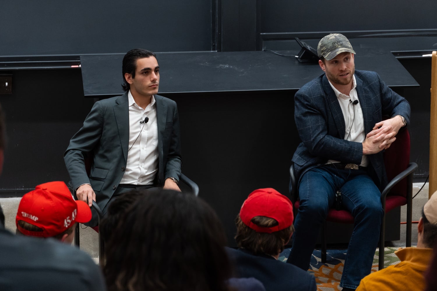 Joe Lonsdale, right, speaks at a event moderated by Harvard Republican Club president Michael Oved '25 Tuesday evening. Lonsdale co-founded Palantir Technologies with Peter Thiel, Alex Karp, and Stephen Cohen.