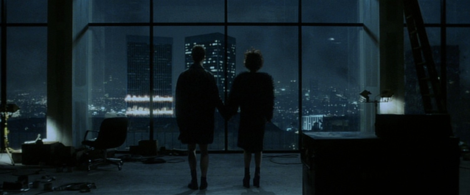 Edward Norton and Helena Botham Carter's characters in the final scene of David Fincher's "Fight Club"