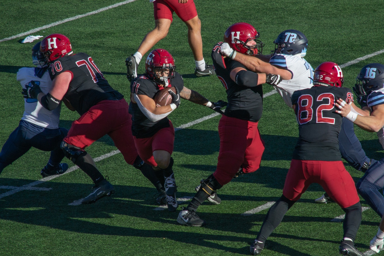 Sophomore running back Xaviah Bascon weaves through Columbia's defense. Bascon ended the game with 113 rushing yards, his best performance of the season.