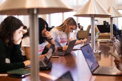 Cover image for Harvard Law School Students Protest in Library, Leave Before ID Checks