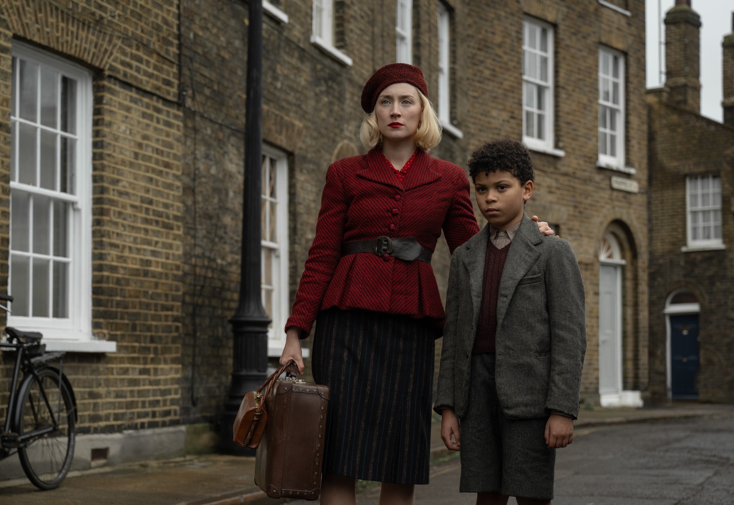 Saoirse Ronan and Elliott Heffernan in "Blitz" which is now playing in theaters and premiering globally on Apple TV+ on November 22.