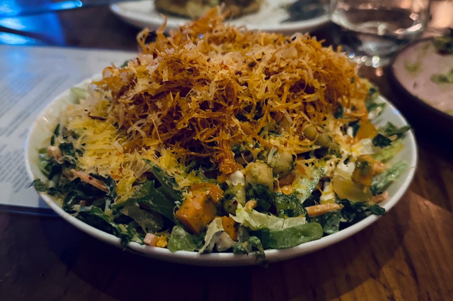 Staying on the vegetarian side of things, the preserved lemon Caesar salad — a clever little dish topped with gloriously crunchy sweet potato shoestring fries — is not very Caesar-eque, but still very salad.