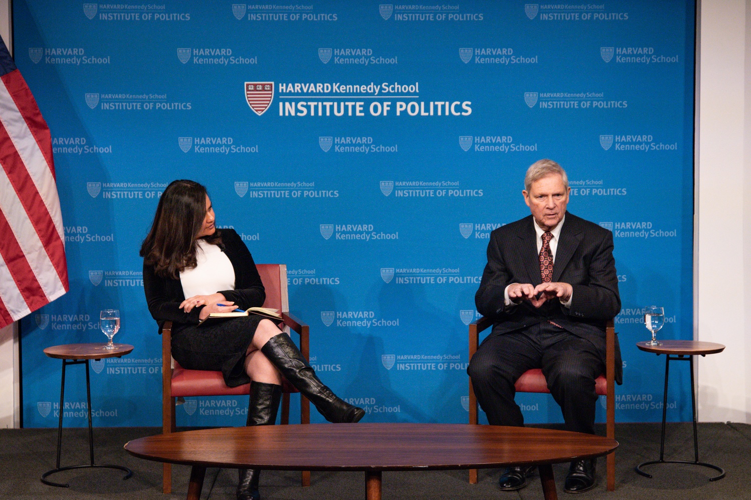 U.S. Agriculture Secretary Tom J. Vilsack, right, discusses food, farm, and rural policy at a Thursday IOP forum moderated by Government lecturer Sparsha Saha, left.