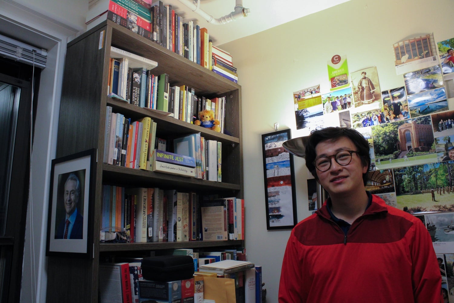 S. Max Fan '26 and his bookshelf.