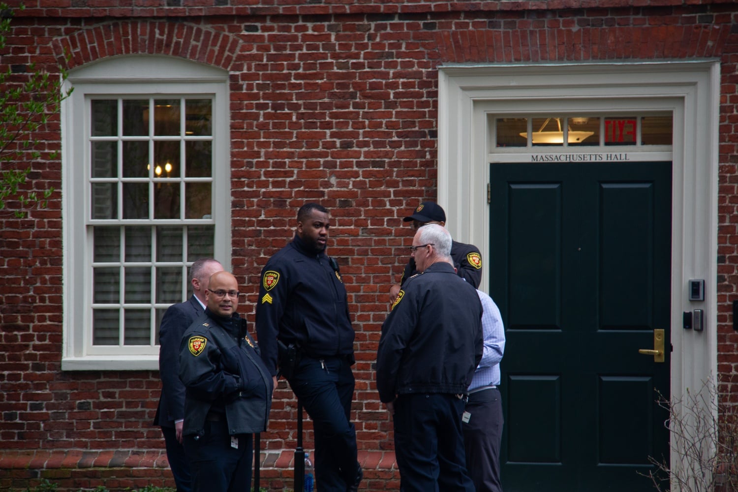 Harvard University Police Department officers stand outside Massachusetts Hall during the spring 2024 pro-Palestine encampment.