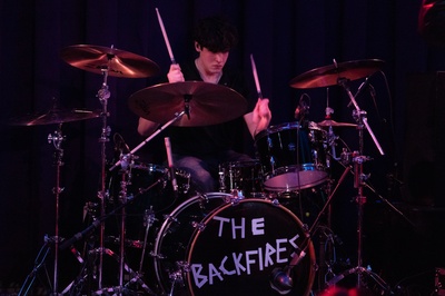 Cover image for The Backfires Drummer