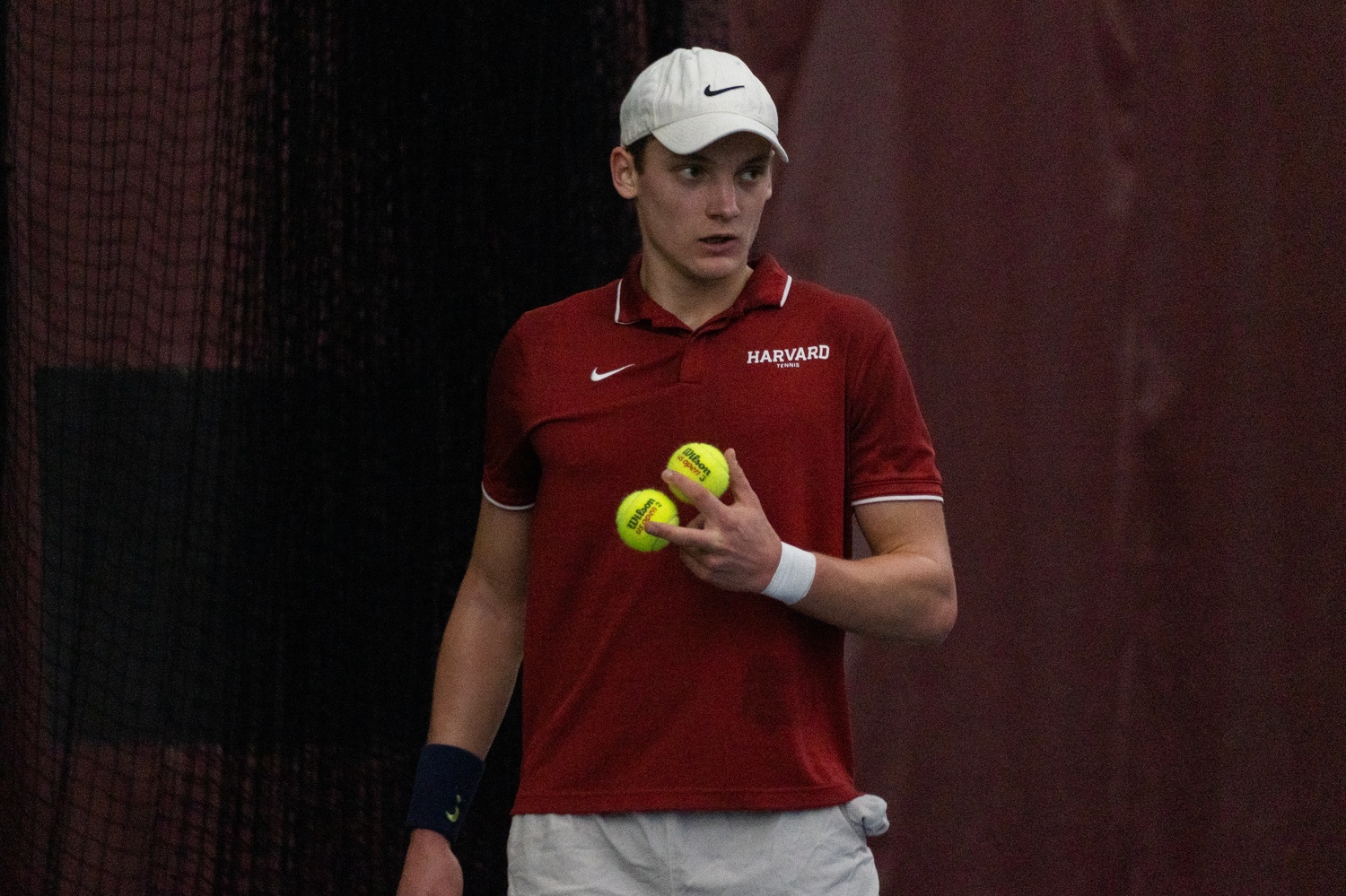 Melchoir Delloye preps to serve during a match in February, 2025. The senior is prepping to play in the NCAA Individual Championships after punching his qualifying ticket at ITA Sectionals