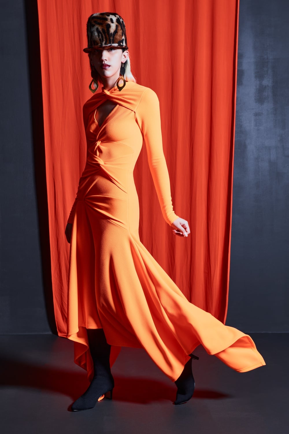 One of the most memorable looks of the collection was a neon orange dress.