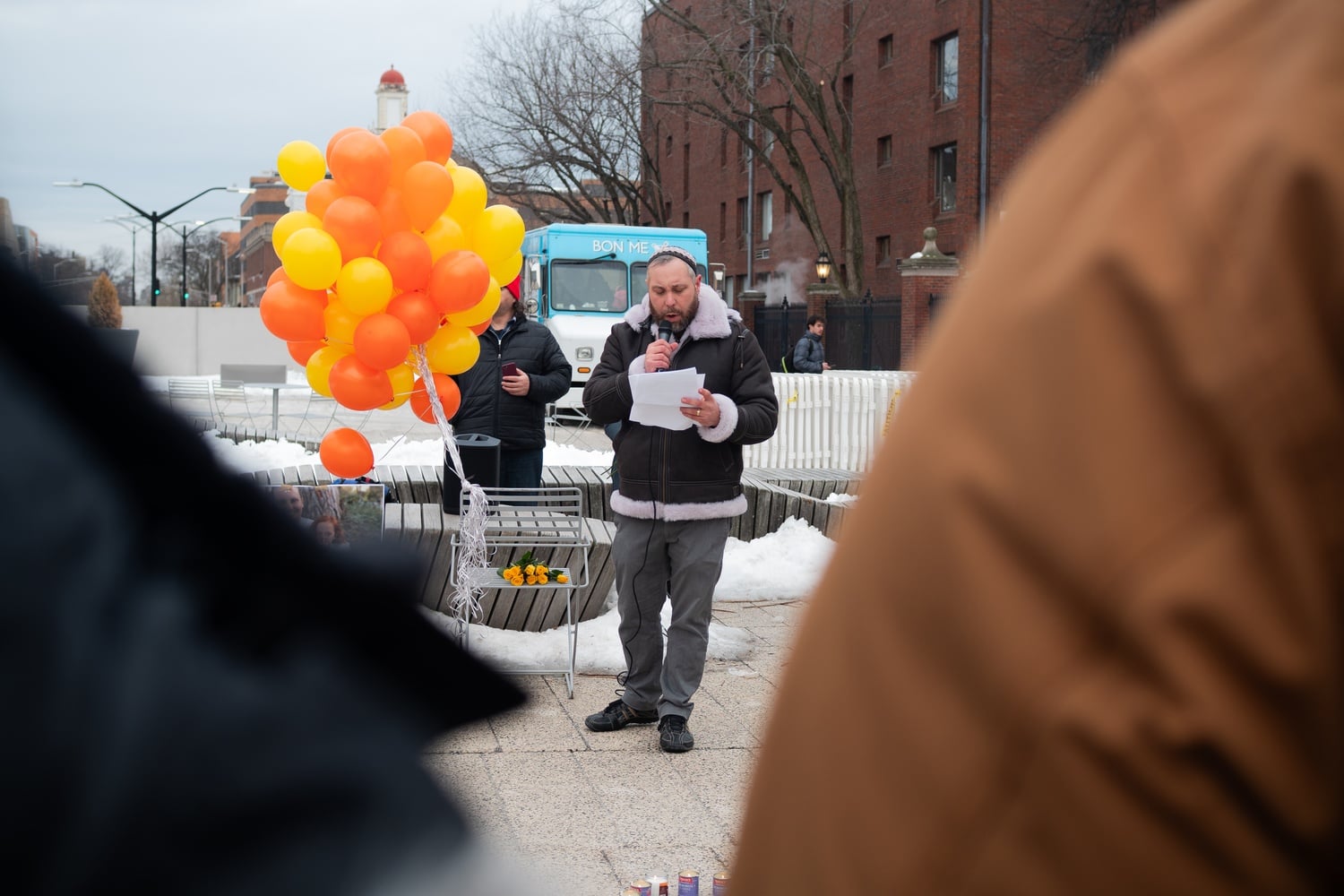 Rabbi Getzel Davis speaks at a vigil in Febuary. Davis left his role as campus rabbi at Harvard Hillel suddenly on Tuesday.