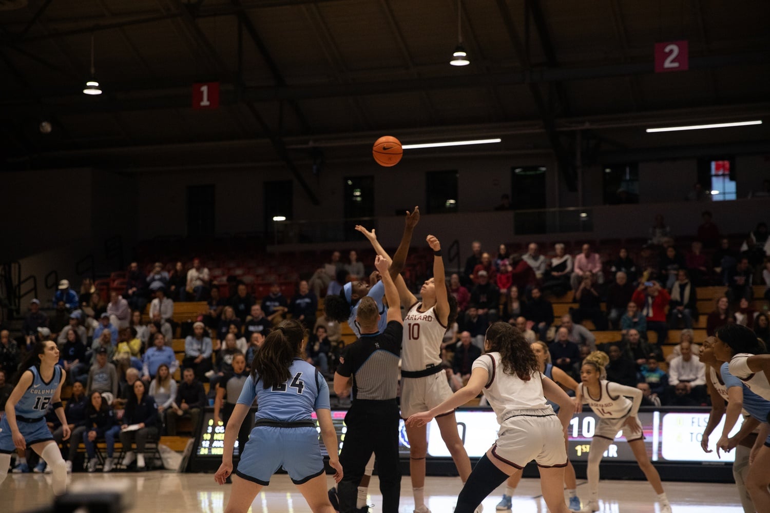 Harvard women’s basketball team and the Columbia Lions jump for the tip off in a regular season meeting at Lavietes Pavilion. The Crimson and the Lions are facing off in the Ivy League tournament championship game.