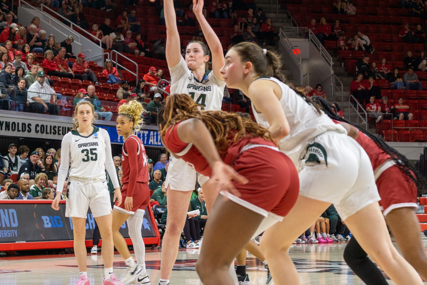 Michigan State shoots against the Crimson in the first round of March Madness Saturday.