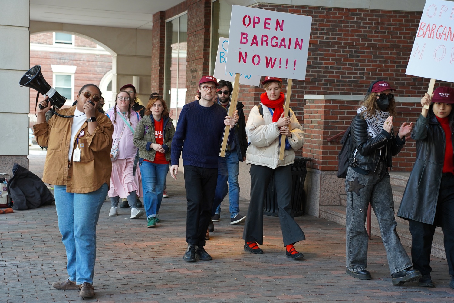 Harvard Graduate Students Union-United Auto Workers President Sara V. Speller leads a union picket outside 124 Mount Auburn St, where negotiations with Harvard take place. The picket was organzied to protest Harvard's firm stance against allowing in-unit members to observe bargaining sessions.