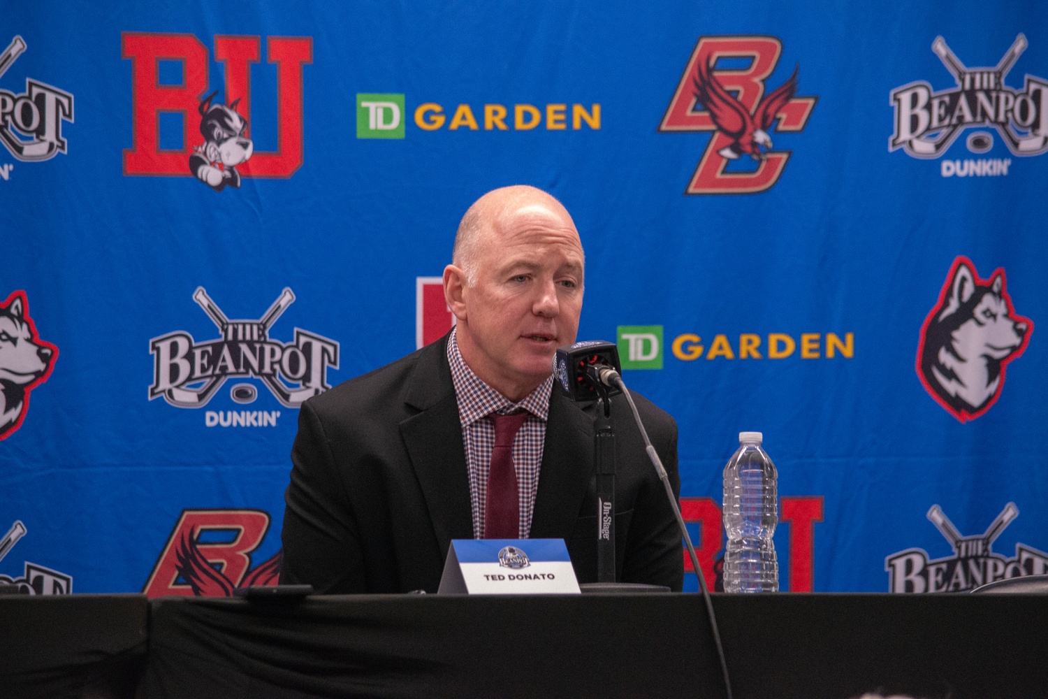 Head Coach Ted Donato takes questions following the Beanpot semifinal at TD Garden.