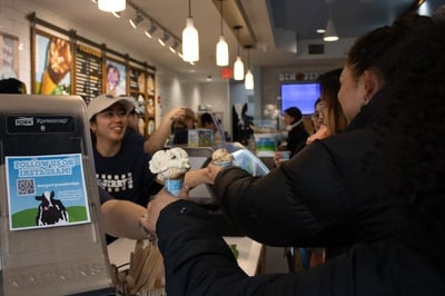 Cover image for Cone and Get It: Students and Cambridge Residents Head to Ben & Jerry’s for Free Cone Day