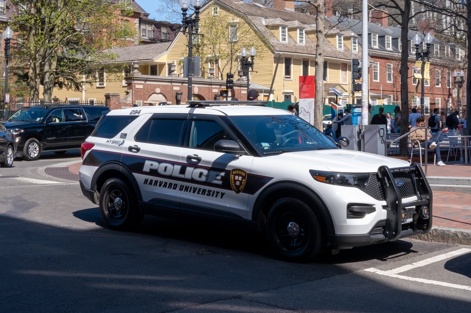 Harvard University Police Department vehicle sits outside the Harvard MTBA station. Shots were fired in the station on Sunday afternoon.