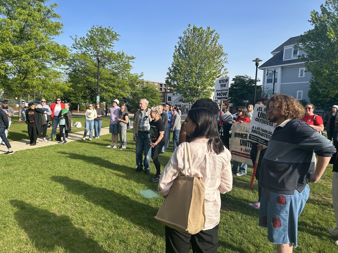Allston-Brighton residents gathered near the Charleston Residences to condemn alleged Immigration and Customs Enforcement Activity in the neighborhood.