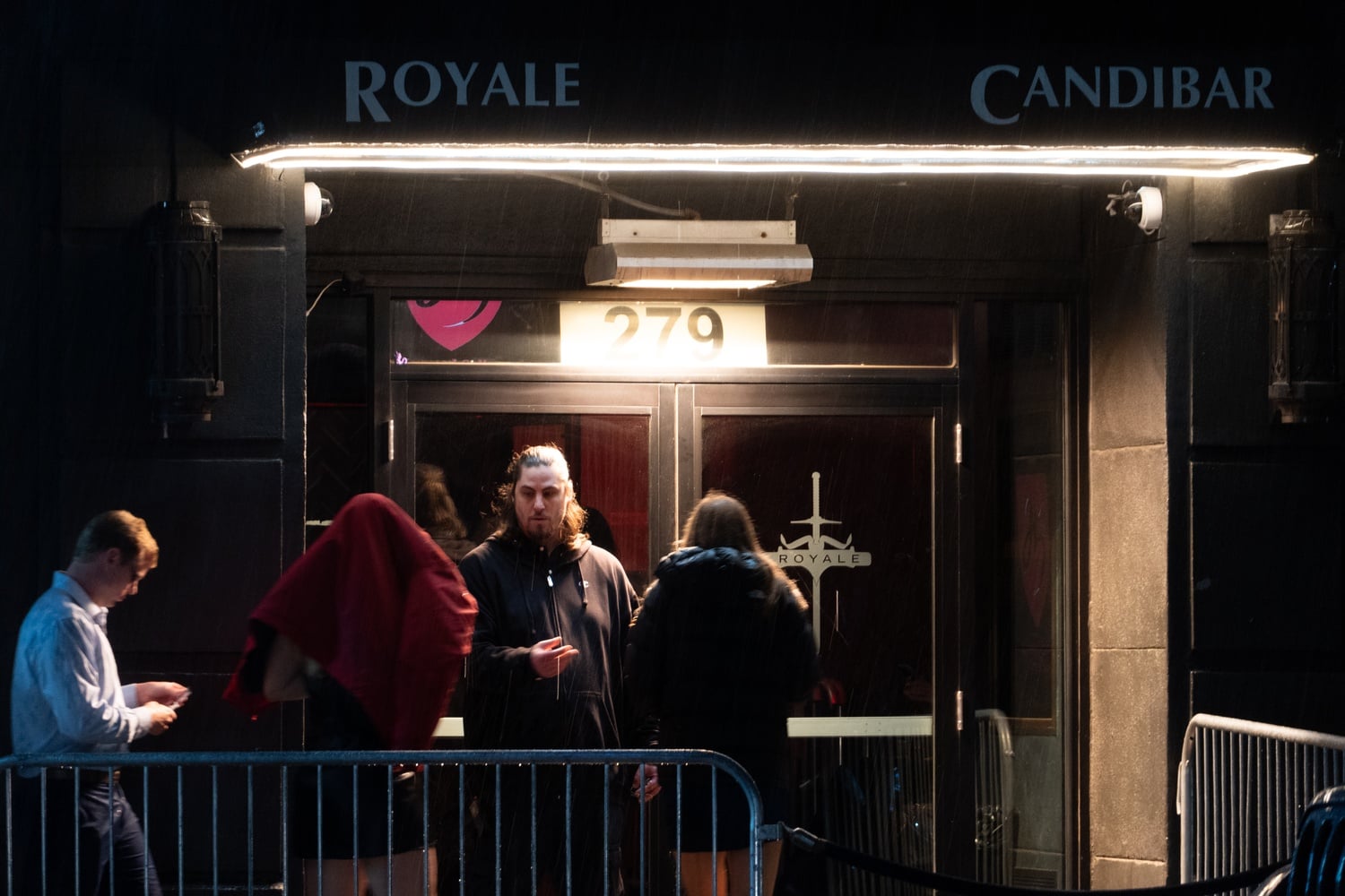 Students walk into the Royale Club in Boston for Harvard's annual Last Chance Dance during Senior Week.