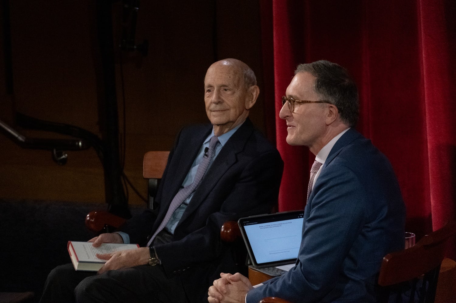 Andrea A. Baccarelli speaks with former U.S. Supreme Court Justice Stephen G. Breyer at a November 2024 Harvard School of Public Health event.