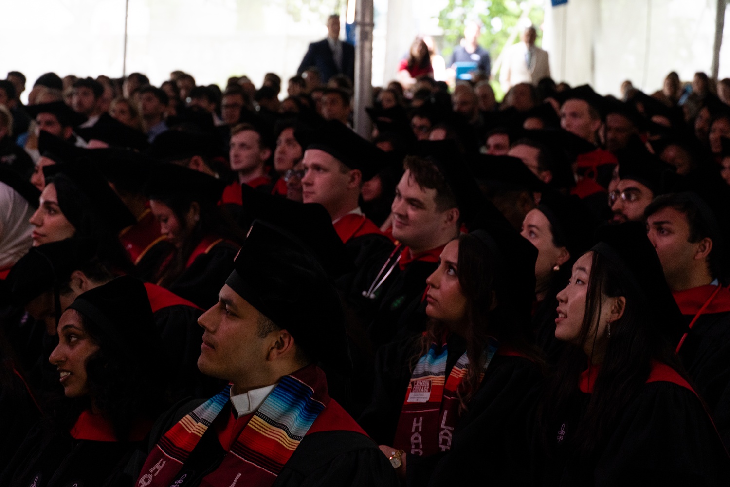 New graduates gather and listen to speakers at the 2025 Harvard Medical School and Harvard School of Dental Medicine Class Day celebration.