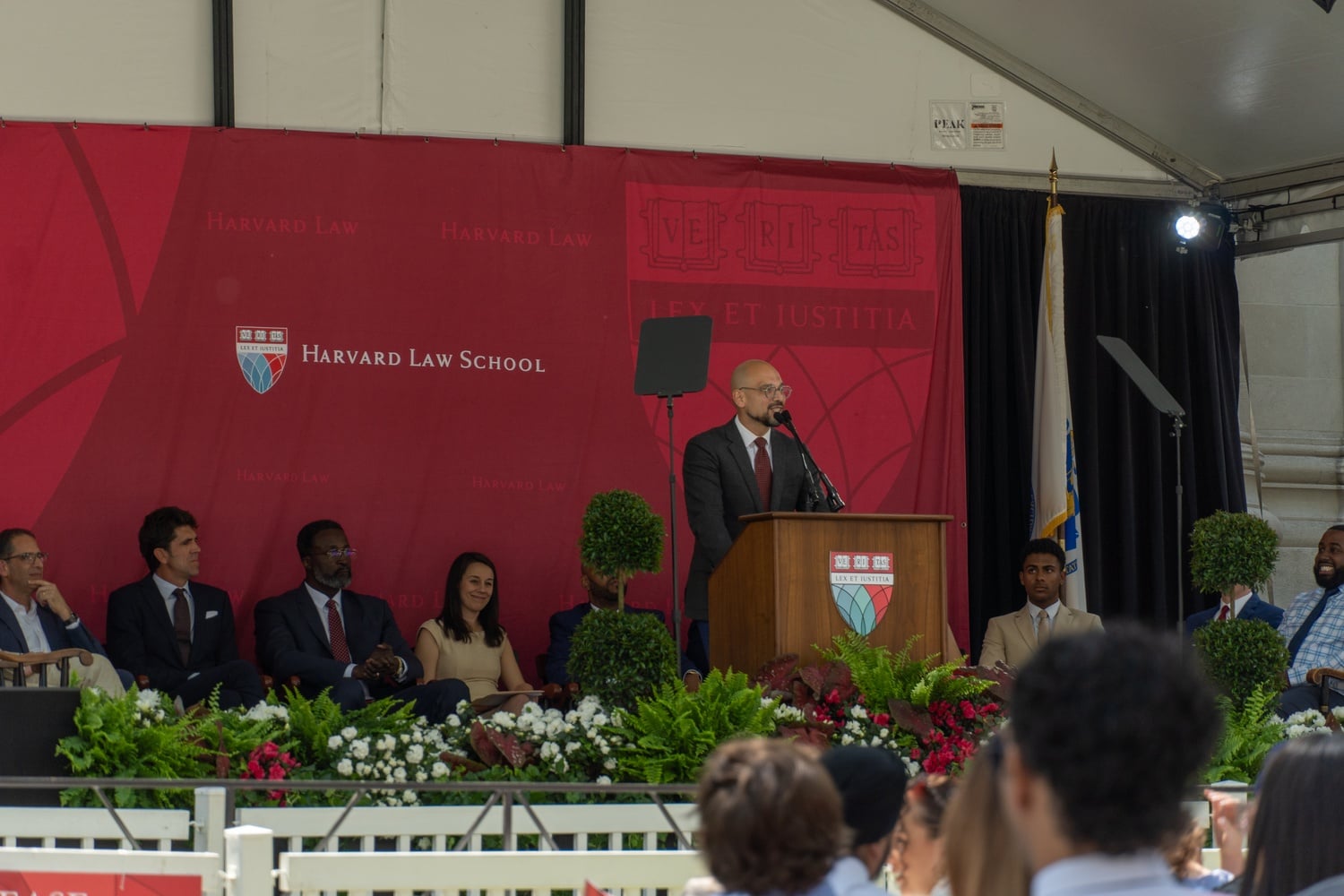 Harvard Law School professor Andrew M. Crespo delivered a ringing critique of both the Trump administration and Harvard at the school’s Class Day celebration in May 2025.