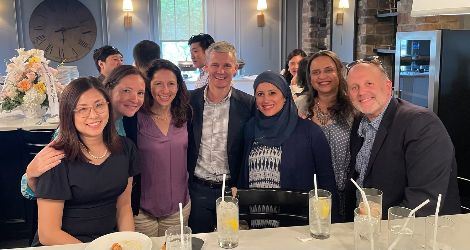 Fazili (third from right) at a recent group gathering.