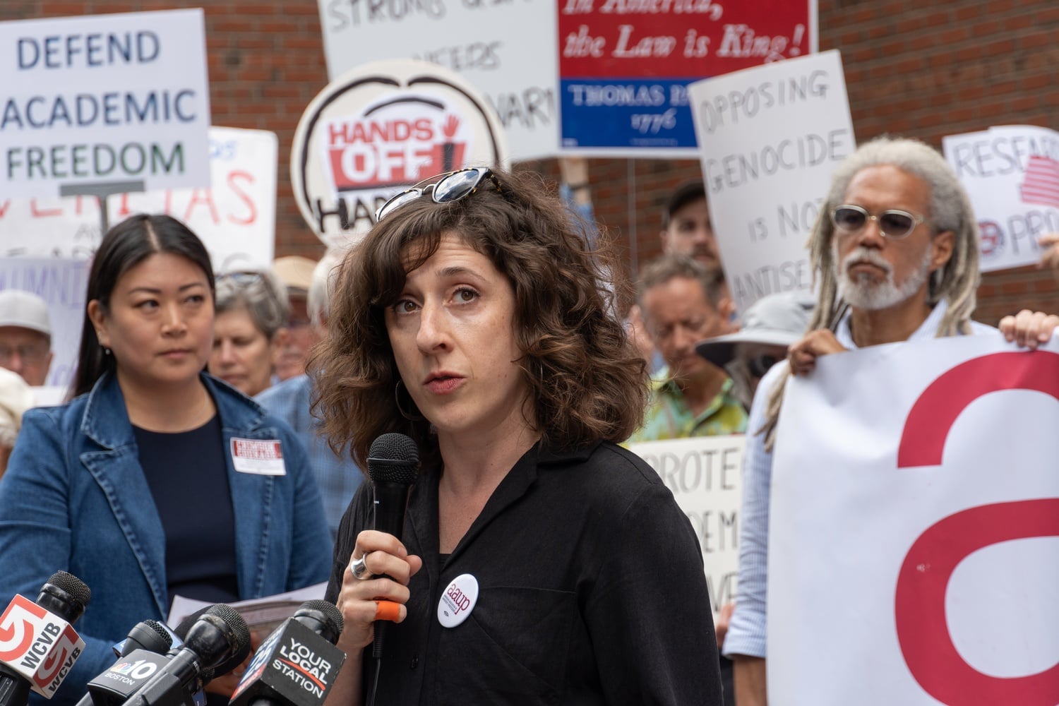 Kirsten A. Weld, president of the Harvard chapter of the American Association of University Professors, speaks at a rally outside the last day of arguments in the AAUP’s lawsuit against the Trump administration over immigration policy. The trial took place in the John Joseph Moakley Courthouse in Boston.