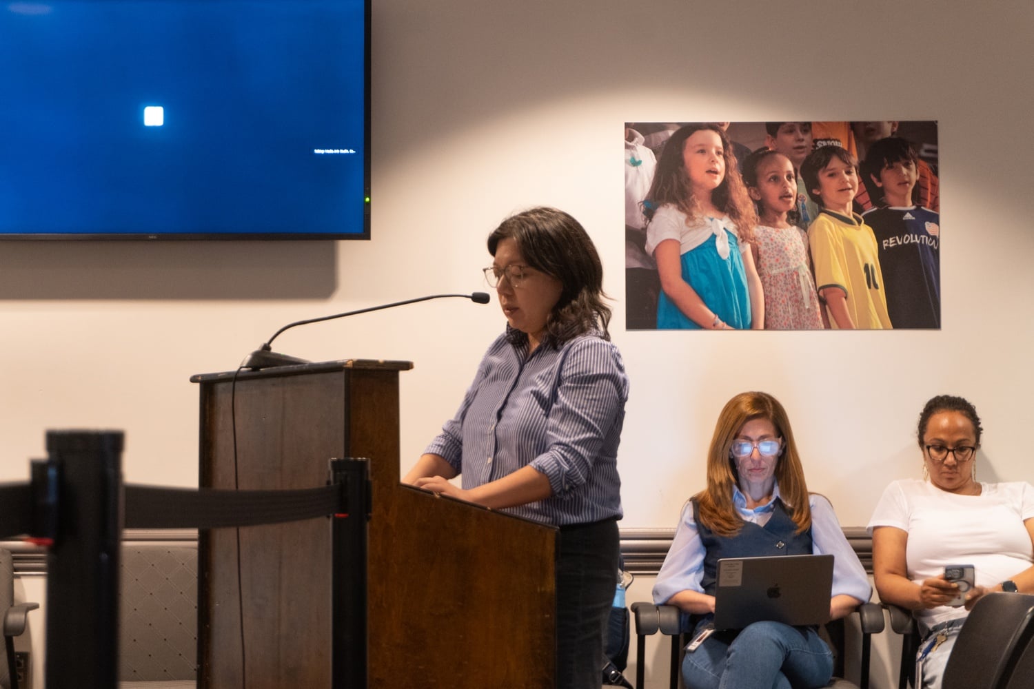 School Committee Candidate Jia-Jing Lee speaks at the Cambridge School Committee Meeting on Tuesday.