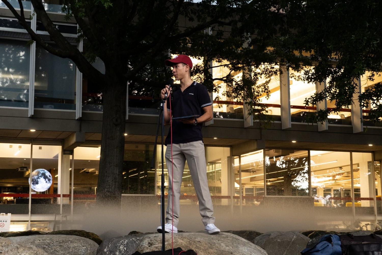 Harvard Queer Students Association co-president Eli M. Visio ’26 speaks at Saturday’s Students for Freedom rally.